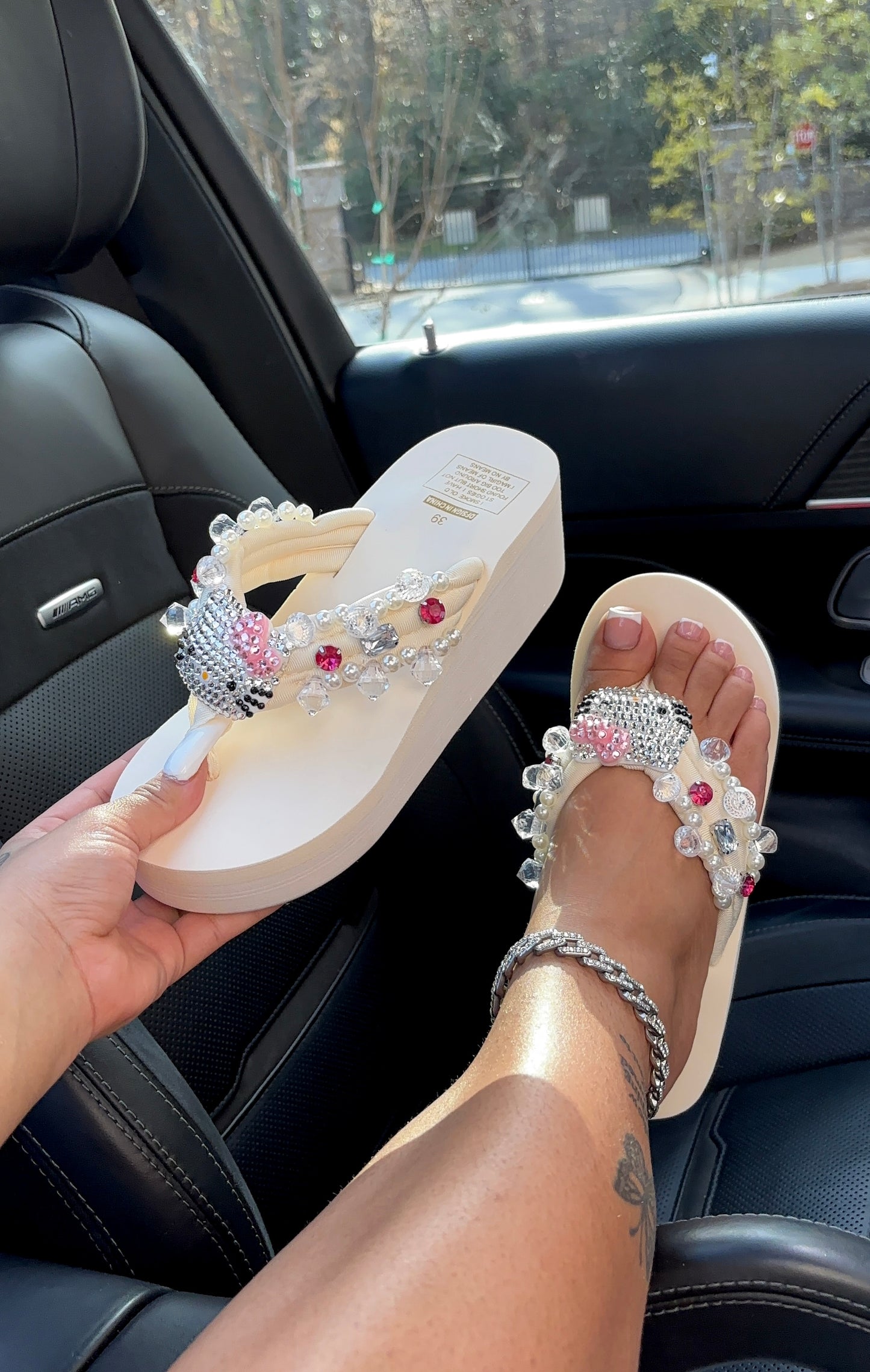bedazzled kitty flip flops